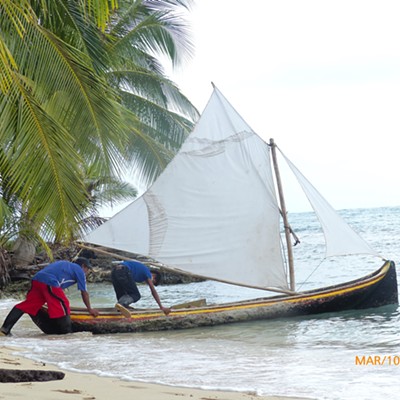 Indigenous Guna Yala sail handmade canoes among their islands to gather coconuts for trade. Photo taken by Sarah Walker of Moscow, San Blas islands, Panama, March 10, 2017.