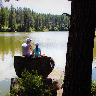 Our son, Scott, and his daughter, Audjrey, taking in a quiet nature moment on a huge rock at Winchester Lake. Taken June 28, 2017, by Mary Hayward of Clarkston.