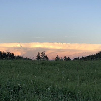 An evening thunderstorm begins to gather looking east of Moscow on Sunday June 13, 2021. The clouds reflected the sunset glow for only a brief time in a display viewed from a hilltop above Wallen Road near Moscow.