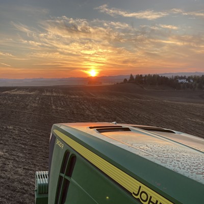 Early morning sunrise while my husband is planting winter wheat.