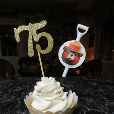 Le Ann Wilson whipped up big batch of cupcakes to celebrate Smokey Bear's 75th birthday.  The photo was taken August 5 at the North Fork Ranger Station, Orofino.