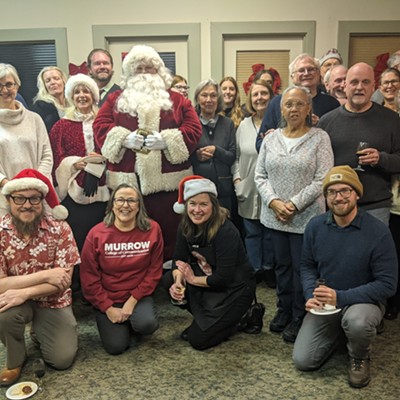 The College Hill Association hosts a holiday party for supporting members and community partners at the Pullman Depot Heritage Center on December 3, 2022.