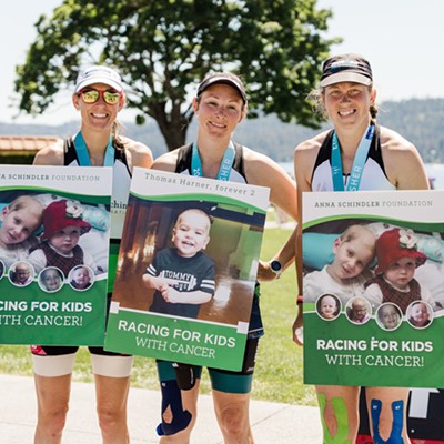 Julie Sawyer of Moscow, Cat Harner of Moscow, and Sarah Roberts of Pullman competed in this weekend's Couer d'Alene 70.3 Ironman triathlon on the Ironman for Anna team, which raises money for local families fighting cancer. As a team, they were able to raise over $8,000 (with CDA teammate Patick, not pictured). Pictured also within the picture is Thomas Harner, who lost his battle to cancer at the age of two. A 70.3 Ironman consists of a 1.2 mile swim, 56 mile bike ride, and 13.1 mile run.