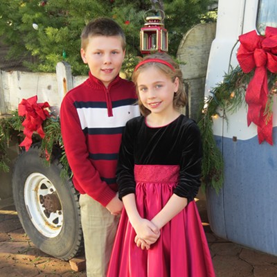 Eli, 10, and Maddy Martin, 9, of Lewiston, posed for a pretty holiday picture while visiting family in Orofino. The photo was taken Dec. 3 outside of the Orofino Flower Shop.