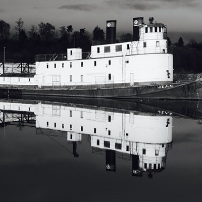 Walking on the bike path at the Grain Growers boat ramp. I shot this photo of the Jean on Dec. 24, 2003.