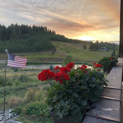 The sun rose on Labor Day 2020 with strong winds keeping the flag waving. The morning rays showcased the smoke from wildfires burning to the south of Moscow, Idaho. Photo by Karen Purtee, on Brood Road, east of Moscow on Monday, September7, 2020.
