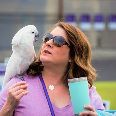 At the Relay for Life in Clarkston this woman was joined by her bird on her shoulder and got quite positive attention. Taken June 10, 2017 by Mary Hayward of Clarkston.