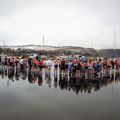 Quite a few people showed up to participate in this New Year's Day Polar Plunge. They lined up and patiently waited for the OK to jump into the frigid water. Photo by Mary Hayward of Clarkston.