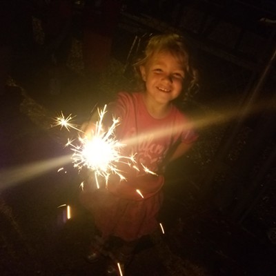 Veronica Rauch, age 3, enjoying sparklers on the 4th of July in Pierce, Idaho. Photo taken by Jessica Rauch.
