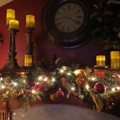 Stewart and Le Ann Wilson have decked their halls at their home in Orofino. A pretty holiday garland and plenty of candles decorate the mantle.