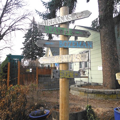 A mileage signpost on the southwest corner of 3rd and Lincoln Streets in Moscow.  Not fully visible in this picture is 2,340 miles to Fairbanks and 1144 to Denver.  Taken on 3-16-23