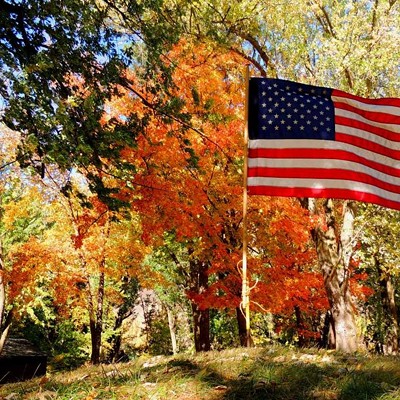 Old Glory flying amidst fall colors - Trailblazer Day (Cub Scouts) at the Spalding Mission near the Nez Perce National Park, Idaho
