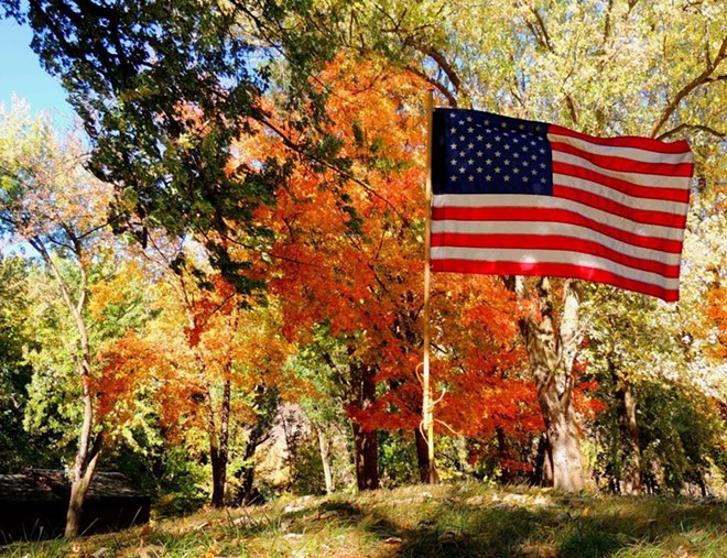 Old Glory flying amidst fall colors - Trailblazer Day (Cub Scouts) at the Spalding Mission near the Nez Perce National Park, Idaho