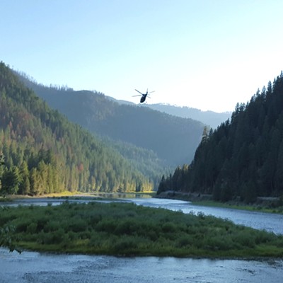 A LifeFlight helicopter making its solitary way above the Clearwater River to Lewiston with its precious cargo - an over 100 mile trip by highway.