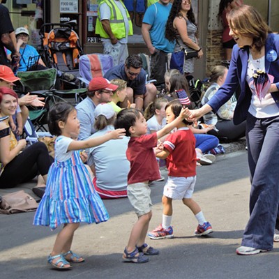 Washington Senator Maria Cantwell was handing out flags to many children attending the Lentil Festival Parade in Pullman. Mary Hayward of Clarkston captures the shot August 18, 2018.