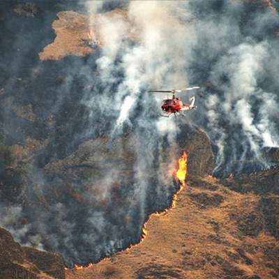 This helicopter was one of several working very hard to put out the massive wild fires. This shot was taken just south of Buffalo Eddy July 9, 2021.
