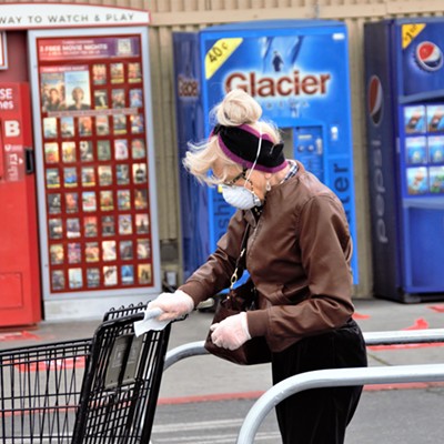 This woman was wiping down the cart before doing her shopping and taking all the precautions needed to stay safe in the new virus world we all live in. Mary Hayward of Clarkston took this shot  April 15, 2020.
