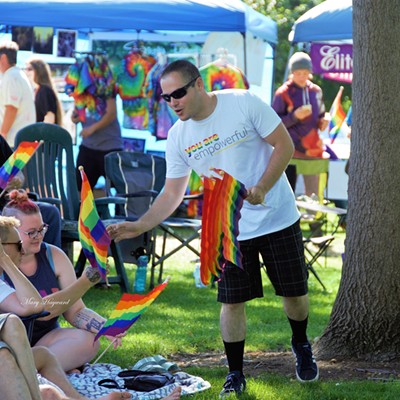 This nice guy was handing out these colorful flags to everyone that wanted one at the Celebrate Love, held @ Pioneer Park. Taken July 13, 2019 by Mary Hayward of Clarkston.