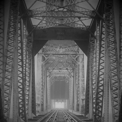 This Bridge probably has more memories attached to it than any bridge in the area.  This bridge is a favorite of anglers far and wide, fishing for steel head and salmon in the fall and bass and trout in the spring and summer.  You'll find many anglers trolling under the bridge and singing or yelling to echo their voices,... and others anchored to the bridge fishing for steelhead at the pillars of the bridge.  If bridges could talk, this one would have a billion stories to tell!!  I know I have many many I could tell, this has to be my favorite spot in the valley....  Taken from the north side of the train bridge, 2021