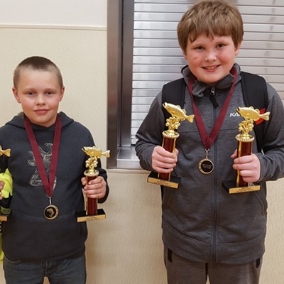 Connor Nitz, 11 and Joey Church, 10, are members of the Webster Elementary Fishing Club. At the Fishing Awards Party on May 4, each earned double trophies. Connor won a trophy for the most fish and the smallest fish. Joey won a trophy for the most fish and the biggest fish. Connor's mother is Leann Warren of Lewiston. Joey's parents are Alex & Jeane Church of Lewiston. Thomas O'Brien of Lewiston took the photo. Each Fishing Club member also received a Fishing Medal and the group is sponsored by the Deatley Family Foundation.