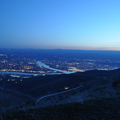 It's a magical time as the twilight begins to fade and the lights of both cities begin to come on cast various colors of light everywhere. 
Photo by Jerry Cunnington, 3/13/21,