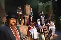 The cast of "Les Miserables" at the Lewiston Civic Theater include members of multiple families. (From left to right) Among the ensemble, Jon Lane shares the stage with his son Frank, 7, wife Kelly Riddle, and son Paul, 5. Kai Klempel, 8, stars as the young Eponine while her brother, Amos, 10, plays Gavroche and her mother Amanda plays multiple roles. - BARRY KOUGH
