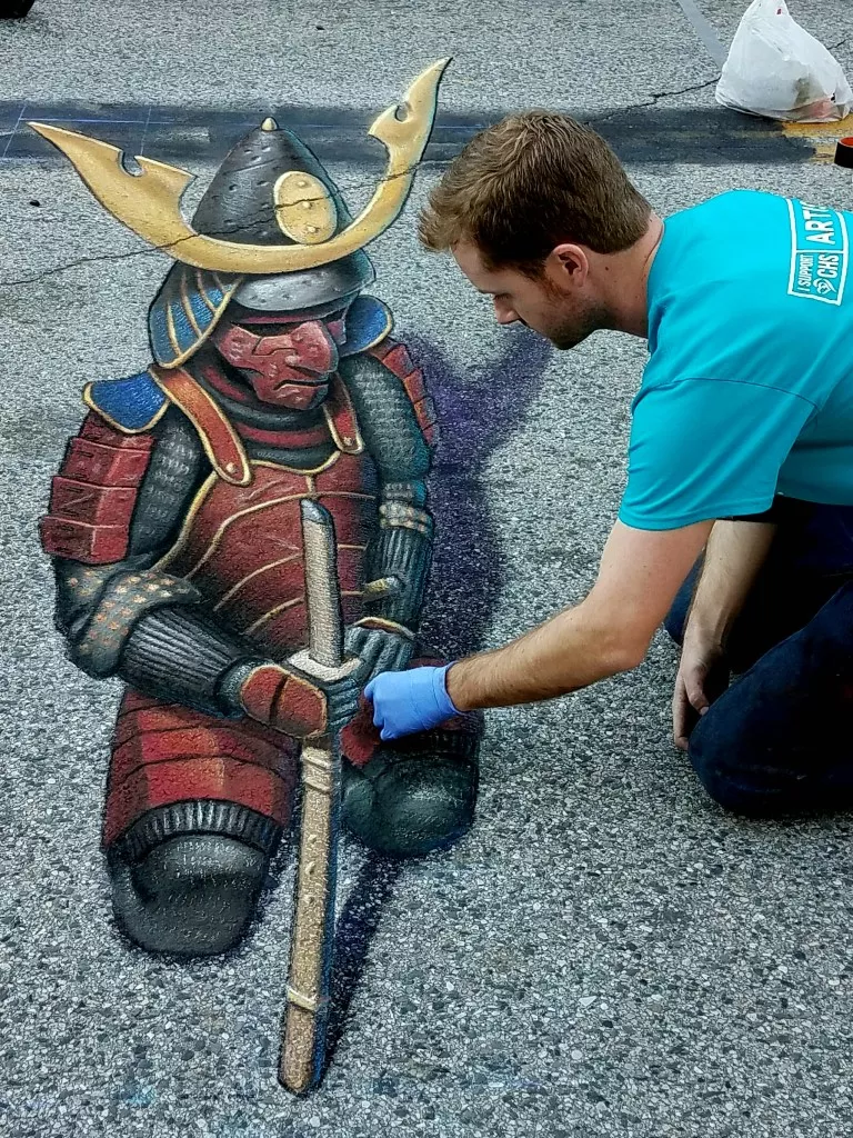 3-D chalk artist knows how to fool the eye