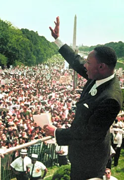 This Aug. 28, 1963, photo shows Dr. Martin Luther King Jr. acknowledging the crowd at the Lincoln Memorial for his "I Have a Dream" speech during the March on Washington. Monday, Jan. 17, 2011, marks the 25th federal observance of the birth of King, one of America's most celebrated citizens, and the only non-U.S. president to be honored with a national holiday. - AP PHOTO/FILE