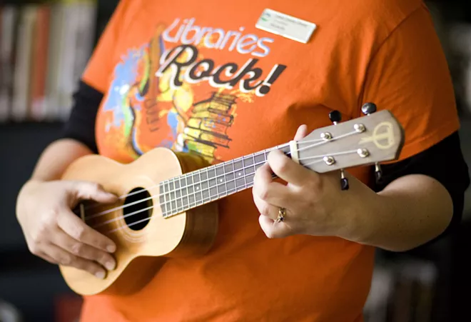 The Moscow Public Library has seven ukeleles that patrons can check out. Three of the instruments were donated by Ukelele Players of the Palouse. - GEOFF CRIMMINS