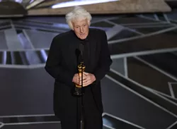 Roger Deakins accepts the award for best cinematography for "Blade Runner" at the Oscars on Sunday, March 4, 2018, at the Dolby Theatre in Los Angeles. - PHOTO BY CHRIS PIZZELLO/INVISION/AP