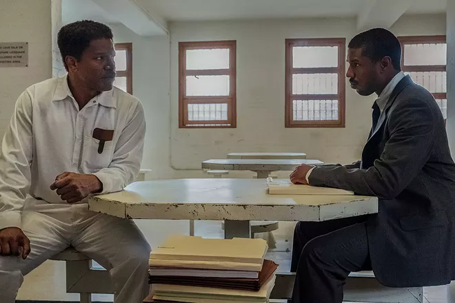 Jamie Foxx (left) and Michael B. Jordan (right) in a scene from "Just Mercy" released by Warner Bros.