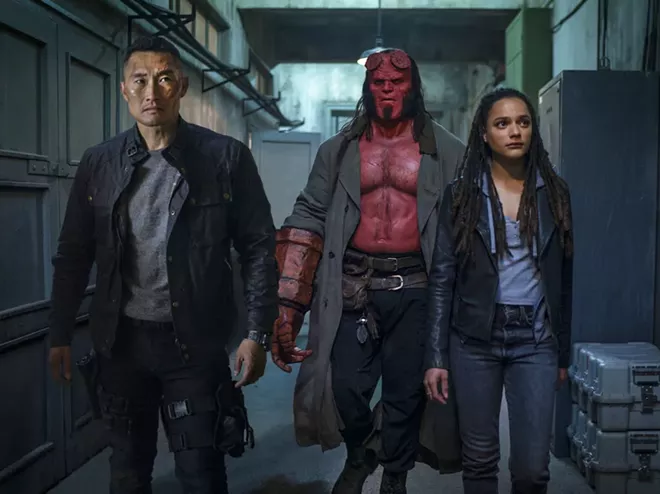 This image released by Lionsgate shows, from left, Daniel Dae Kim, David Harbour and Sasha Lane in a scene from "Hellboy." - MARK ROGERS/LIONSGATE VIA AP