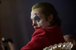 This image released by Warner Bros. Pictures shows Joaquin Phoenix in a scene from "Joker," in theaters on Oct. 4. (Niko Tavernise/Warner Bros. Pictures via AP) - NIKO TAVERNISE/WARNER BROS. PICTURES VIA AP