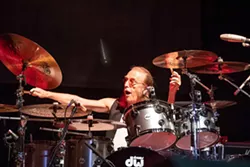 Roger Earl plays drums for Foghat during a Pennsylvania concert in May. -- Steve Reinis photo - STEVE_REINIS_SANDR_IMAGES