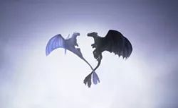 This image released by Universal Pictures shows Light Fury dragon (left) and Night Fury dragon Toothless, in a scene from DreamWorks Animation's "How to Train Your Dragon: The Hidden World." (DreamWorks Animation/Universal Pictures via AP) - DREAMWORKS ANIMATION/UNIVERSAL PICTURES VIA AP