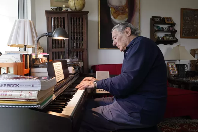 Peter Fuchs plays the piano at his home in Aventura Fla., Tuesday, Feb. 23, 2021. Fuchs and his wife Veronica host a Facebook Live show called "Stump the Maestro". At the start of the show Fuchs plays tunes that viewers try to guess. Then viewers request songs, mostly Broadway show tunes, '50s classics, movie soundtracks, jazz standards and some Beatles music, and Fuchs is a former Broadway composer, conductor and Holocaust survivor. - AP PHOTO/MARTA LAVANDIER
