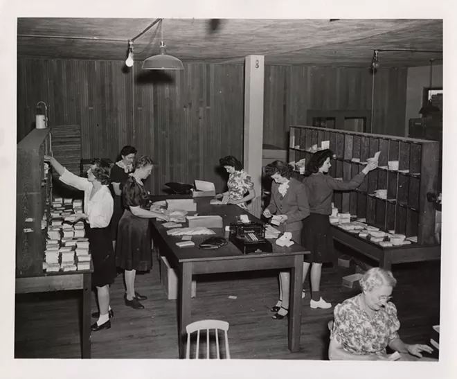 Staff work in the mail room at Psychiana headquarters in Moscow in this photo from 1935. - PSYCHIANA DIGITAL COLLECTION, DIGITAL INITIATIVES, UNIVERSITY OF IDAHO LIBRARY