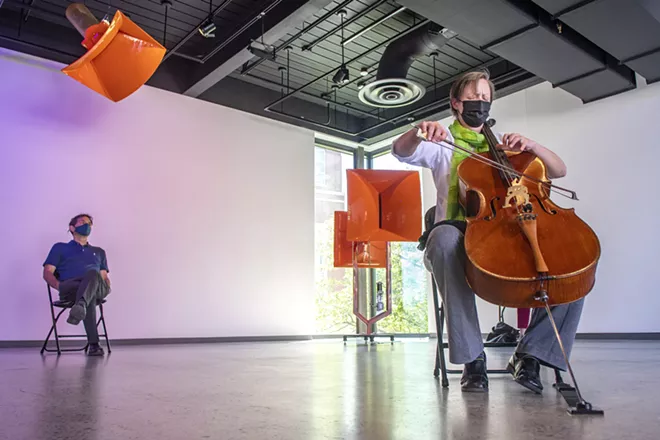Ruth Boden, the Coordinator of the Chamber of Music Program, - performs for an audience in the Jordan Schnitzer Museum - of Art pavilion at Washington State University. “I feel more - relaxed now than I have in the last two years,” Boden said. - ZACH WILKINSON/INLAND 360