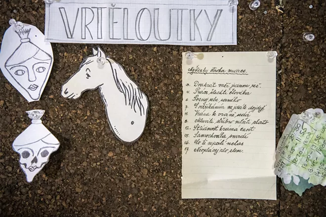 A bulletin board containing her sketches, and a note written in Czech containing wise words from her grandfather, hangs in Holbert’s studio. - ZACH WILKINSON / INLAND 360