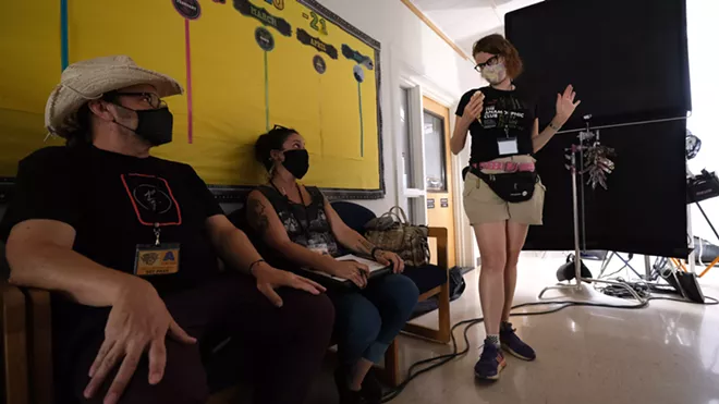 Director Rantz Hoseley and Jessica Winfree, assistant director, listen while Cinematographer Jendra Jarnagin walks through the timing of a shot. - DAN BLAKNEY