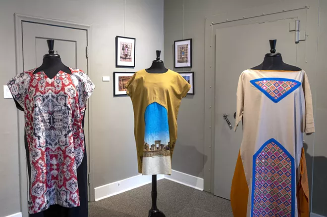 Persian dresses are on display at the “Persepolis: Introducing Persian Culture to the West” on Thursday at the Lewis-Clark State College Center for Arts & History in downtown Lewiston. The show opens on Sept. 24. - PETE CASTER/360