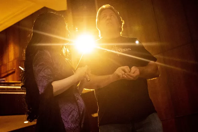 Amy Stout, playing Morticia Addams, talks with Director Larry Goodwin between scenes during a rehearsal for the Addams Family at the old Lewiston High School on Monday evening. - AUGUST FRANK/360