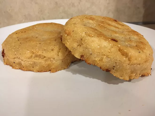 These arepas stuffed with queso fresco, but they may also be made with meat filling — or skip the filling altogether. - KAYLEE BREWSTER/INLAND 360