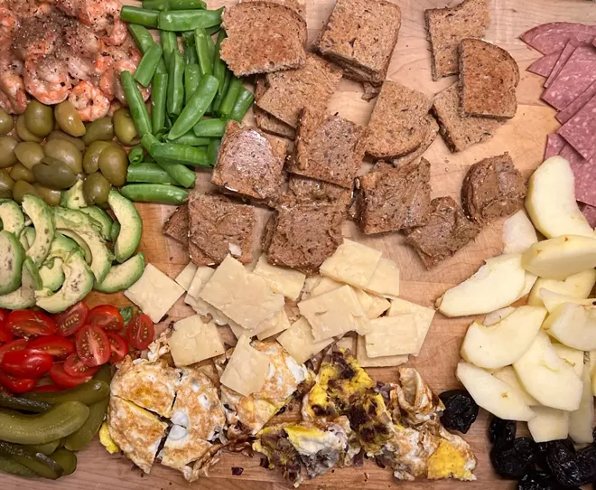 The perfect charcuterie board includes meat, cheese, fruits, veggies — and a solid dose of creativity.