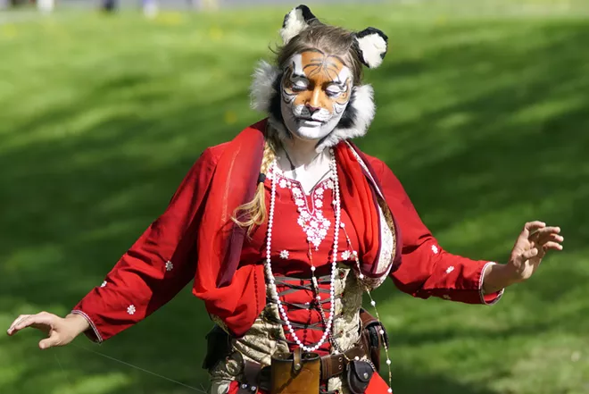 Leora Laurino, dressed as a weretiger, dances during past Moscow Renaissance Fair. The 2022 fair starts Saturday.