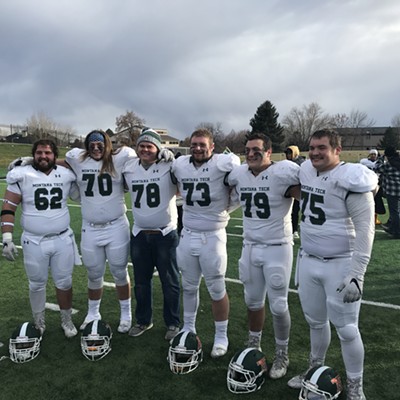 Kellen Davis #73 Moscow High grad celebrates with his fellow offensive linemen after his final football game for Montana Tech November 10 in Billings Montana. Montana Tech beat Rocky Mt College 31-27. Kellen was a 3 year starter for the Orediggers. Photo by Doug Davis.