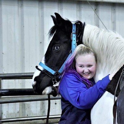 A precious moment caught while taking a break from training at the Lewiston Roundup Grounds indoor arena. Photo of Lilli Moore with her horse Angel, taken by John Culletto on February 9th. Thank you John for taking the time to come take photos.