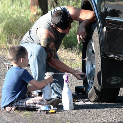 I saw father, Dan,&nbsp;and son, Carson, on a sunny day working on their truck outside their home in Kooskia.&nbsp;I liked the way the son was intently helping his dad. Photogprah by Nan Vance of Kooskia on May 28, 2016.