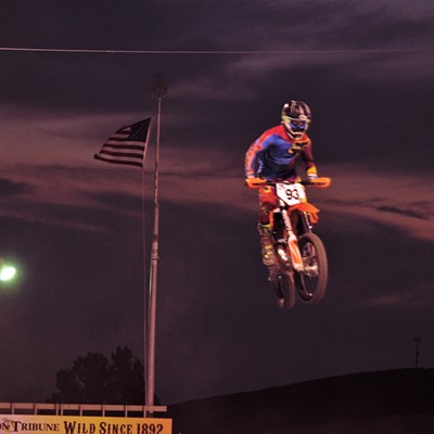 Riding high in the evening sky at the Lewiston Supercross. Photo taken by Sept. 29th by Richard Hayward, Clarkston.