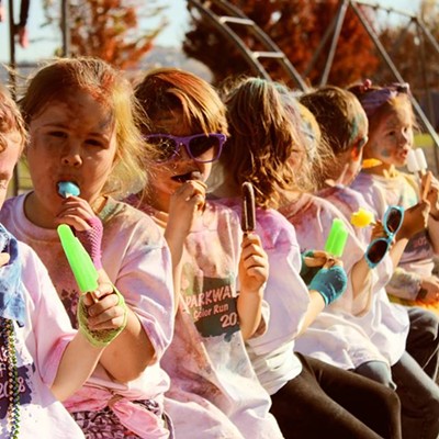 Parkway Elementary students cool off and enjoy some delicious popscicles after participating in the Color Run to help raise money for their school.